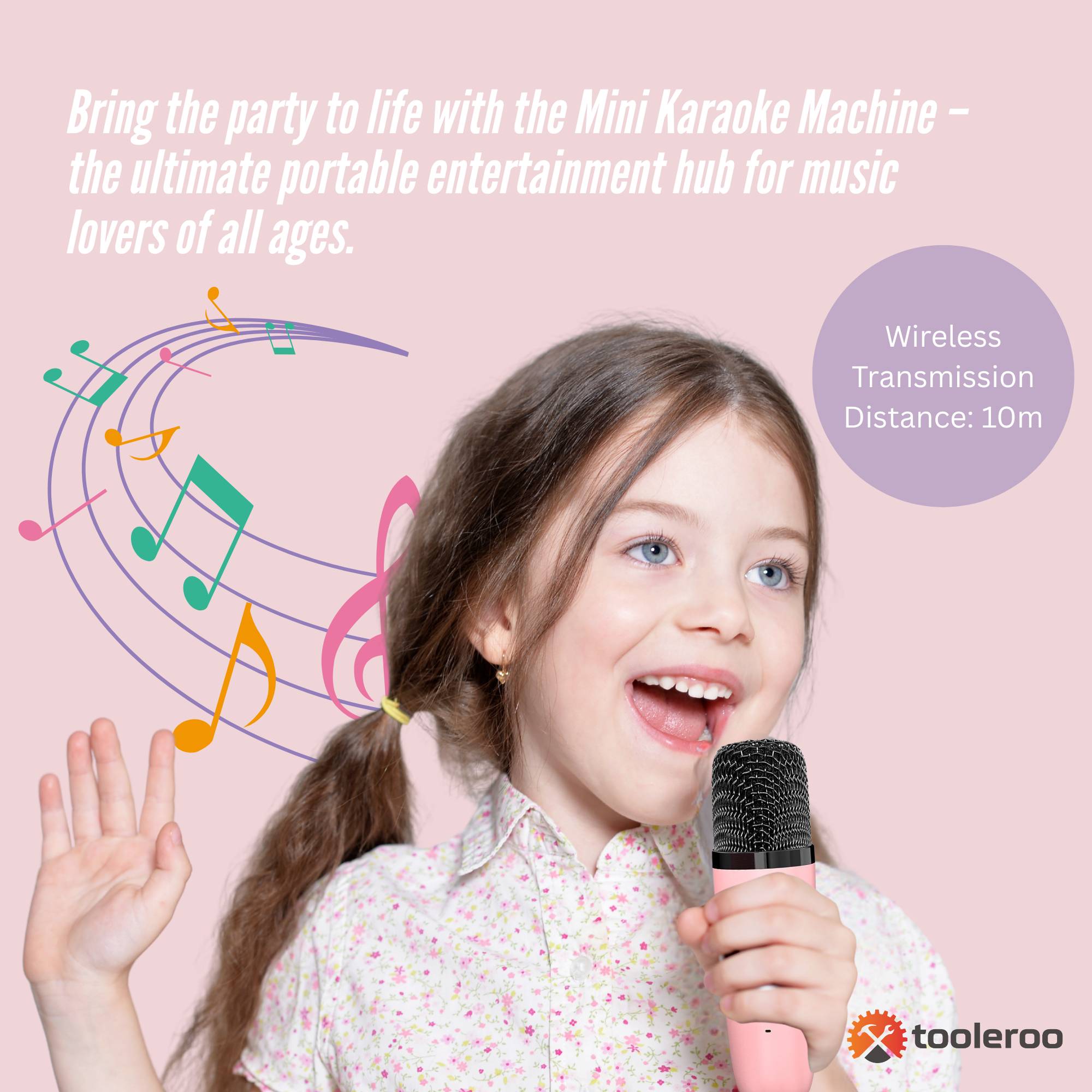 Pink mini karaoke machine speaker with two matching wireless microphones and vibrant LED lights — view 3