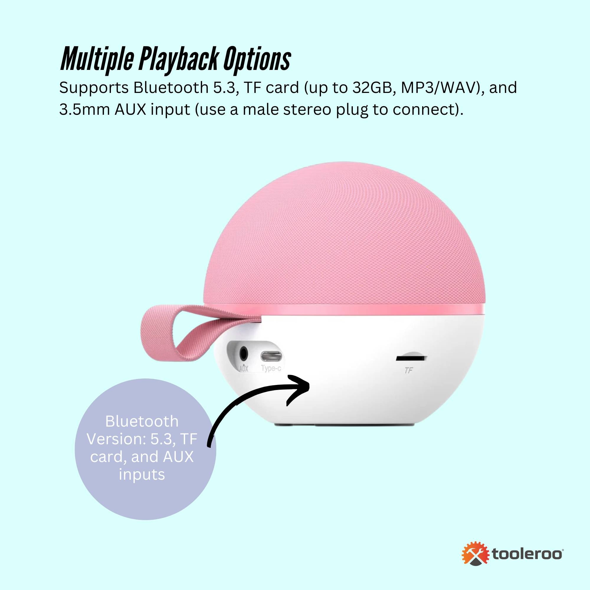 Pink mini karaoke machine speaker with two matching wireless microphones and vibrant LED lights — view 5
