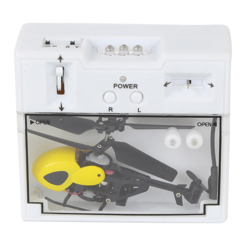 Mini remote control helicopter toy in bright yellow plastic with aerodynamic blades and landing gear — view 3