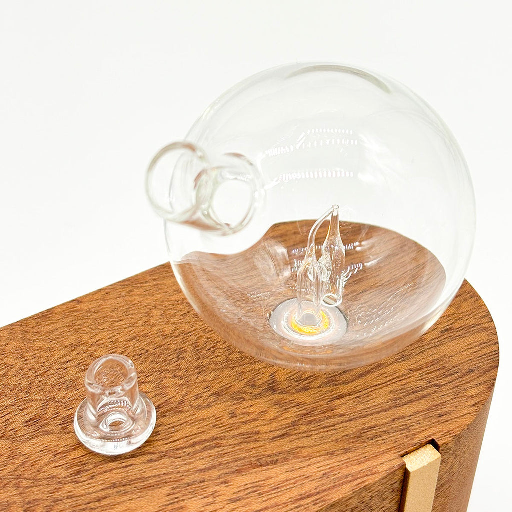 Portable waterless essential oil diffuser made of hand blown glass and African red wood base — view 4