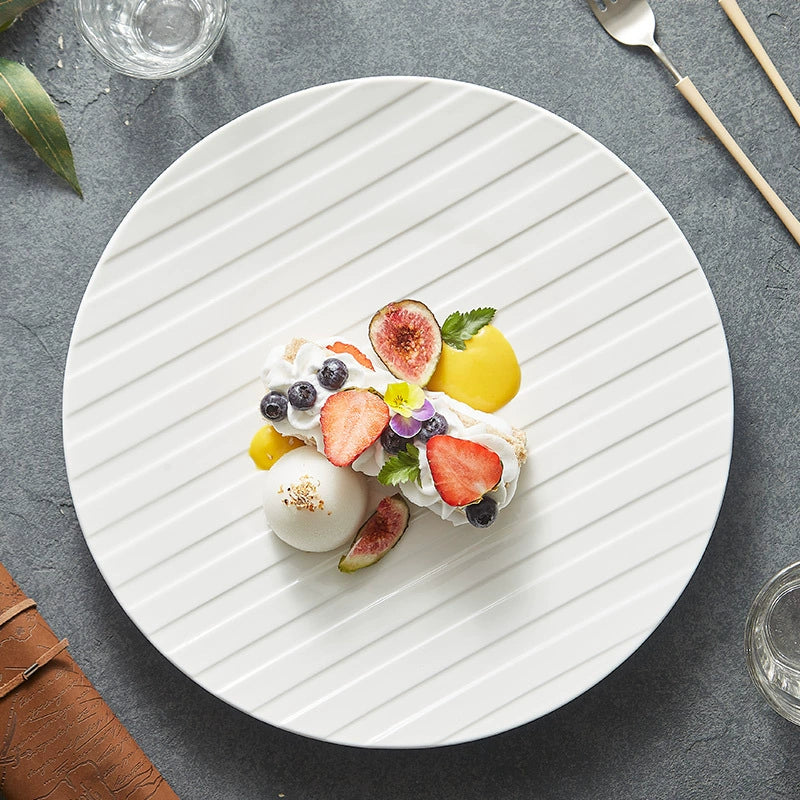 White ceramic plate with diagonal stripe relief texture for elegant modern dining presentations — view 2