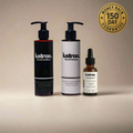 Lustrao hair growth trio set including shampoo, conditioner, and regrowth oil bottles with botanical ingredients.
