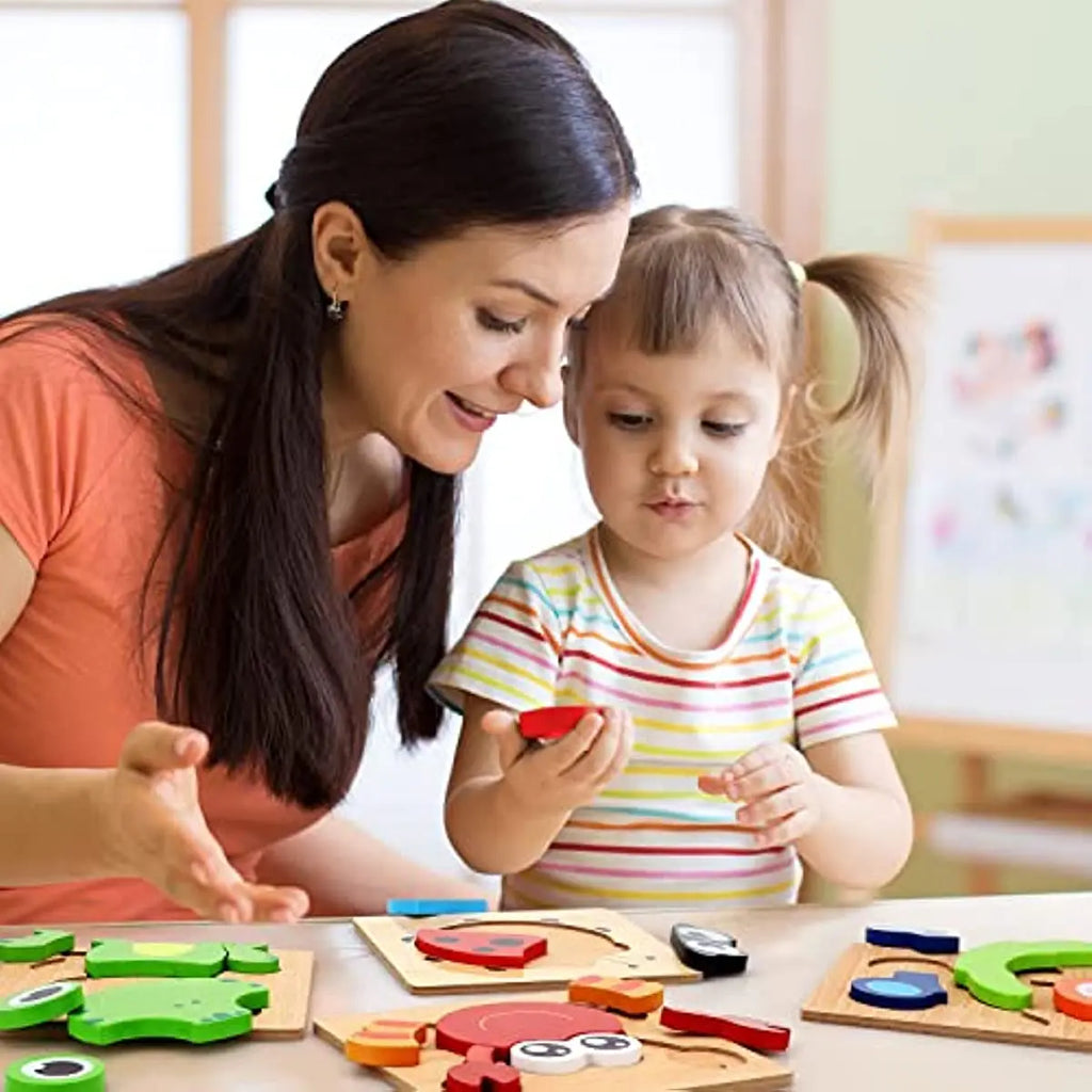 Montessori wooden puzzle with bright colorful animal shapes made of natural wood for toddlers — view 4
