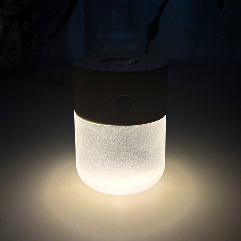 Moonlight essential oil diffuser, minimalist white glass waterless aromatherapy device with built-in LED ambient lighting — view 5