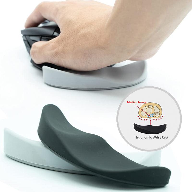 Ergonomic gliding silicone mouse wrist rest pad in black, providing comfortable desk and workstation support