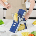 Purple multi-functional vegetable chopper with stainless steel blades for kitchen food preparation