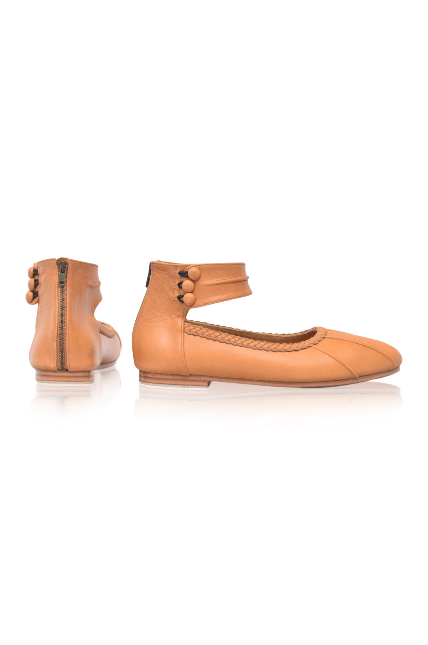 Tan genuine leather ballet flats with ankle strap cuff and back zipper on a white background — view 4