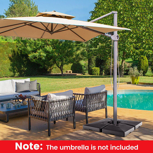 Four-piece black cantilever offset patio umbrella base with stackable design and hidden carrying handles. — view 2