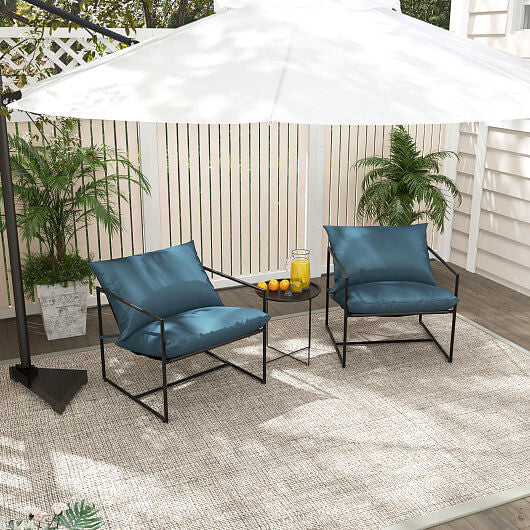 Two navy blue sling accent patio chairs with metal frames and soft weatherproof cushions.