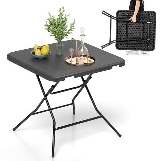 Black 2.6ft foldable dining table with wood grain HDPE surface and non-slip foot pads — view 3
