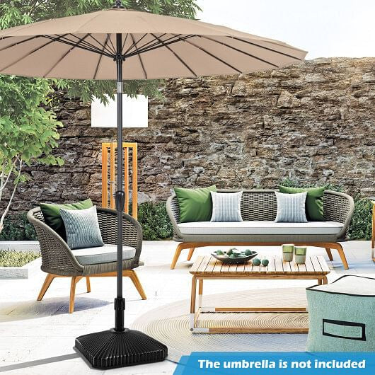 Black fillable patio umbrella base with decorative shell texture and three interchangeable adapter rings — view 2