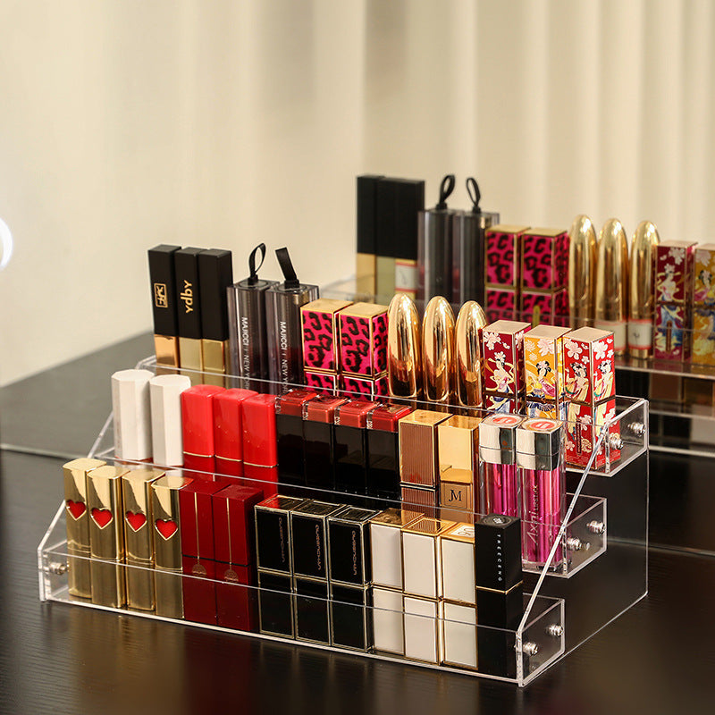 Clear acrylic nail polish organizer stand holding cosmetic bottles on a vanity table — view 3