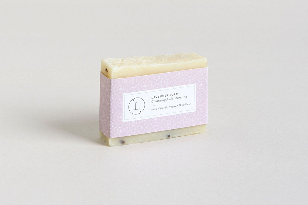 Two natural handmade lavender soap bars with real buds packed in a reusable cotton bag. — view 5