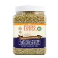 Raw unhulled white sesame seeds in a gourmet BPA-free plastic jar for baking and cooking