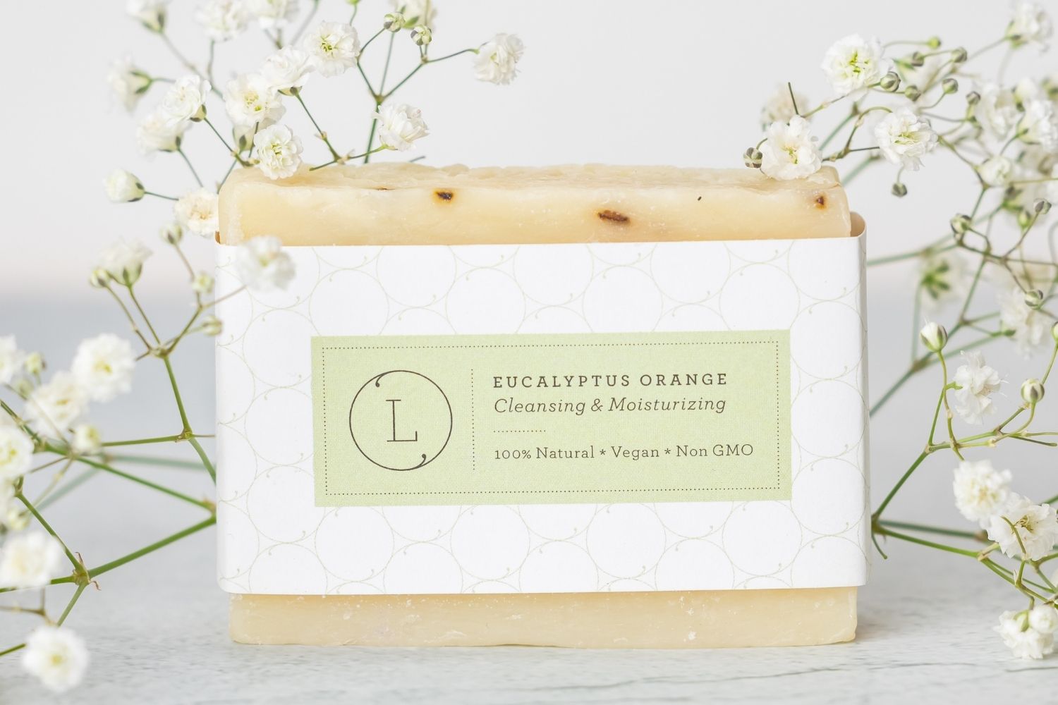 Two handmade natural eucalyptus cold process soap bars packed in a reusable cotton bag — view 4