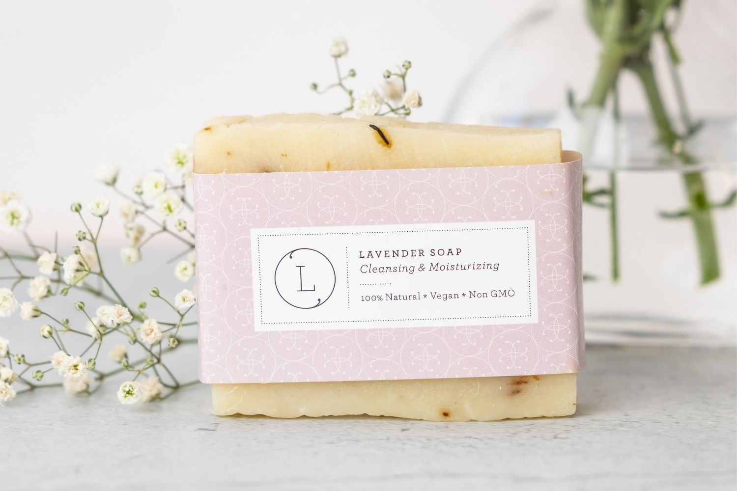 Two natural handmade lavender soap bars with real buds packed in a reusable cotton bag. — view 4