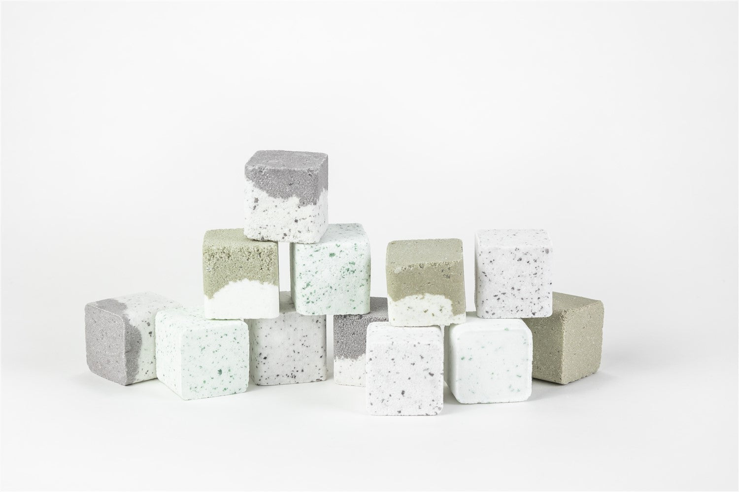Set of 12 earthy shower steamers in a premium gift box with natural botanical tops — view 2