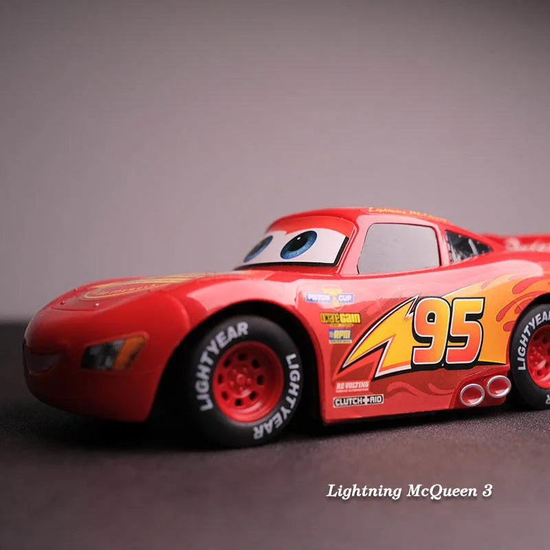 Red Lightning McQueen remote control toy car with black tires and remote controller — view 4