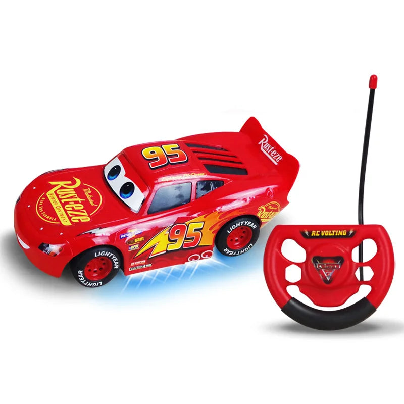 Red Lightning McQueen remote control toy car with black tires and remote controller — view 3