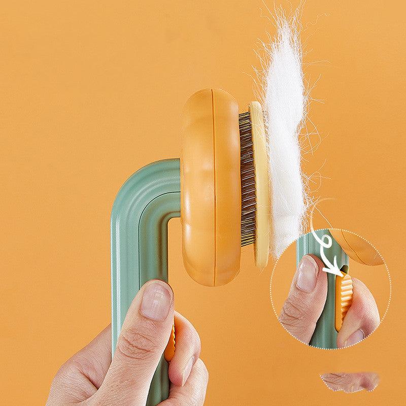 Ergonomic pet cat brush for hair removal with curved head and resin coated steel needles — view 5