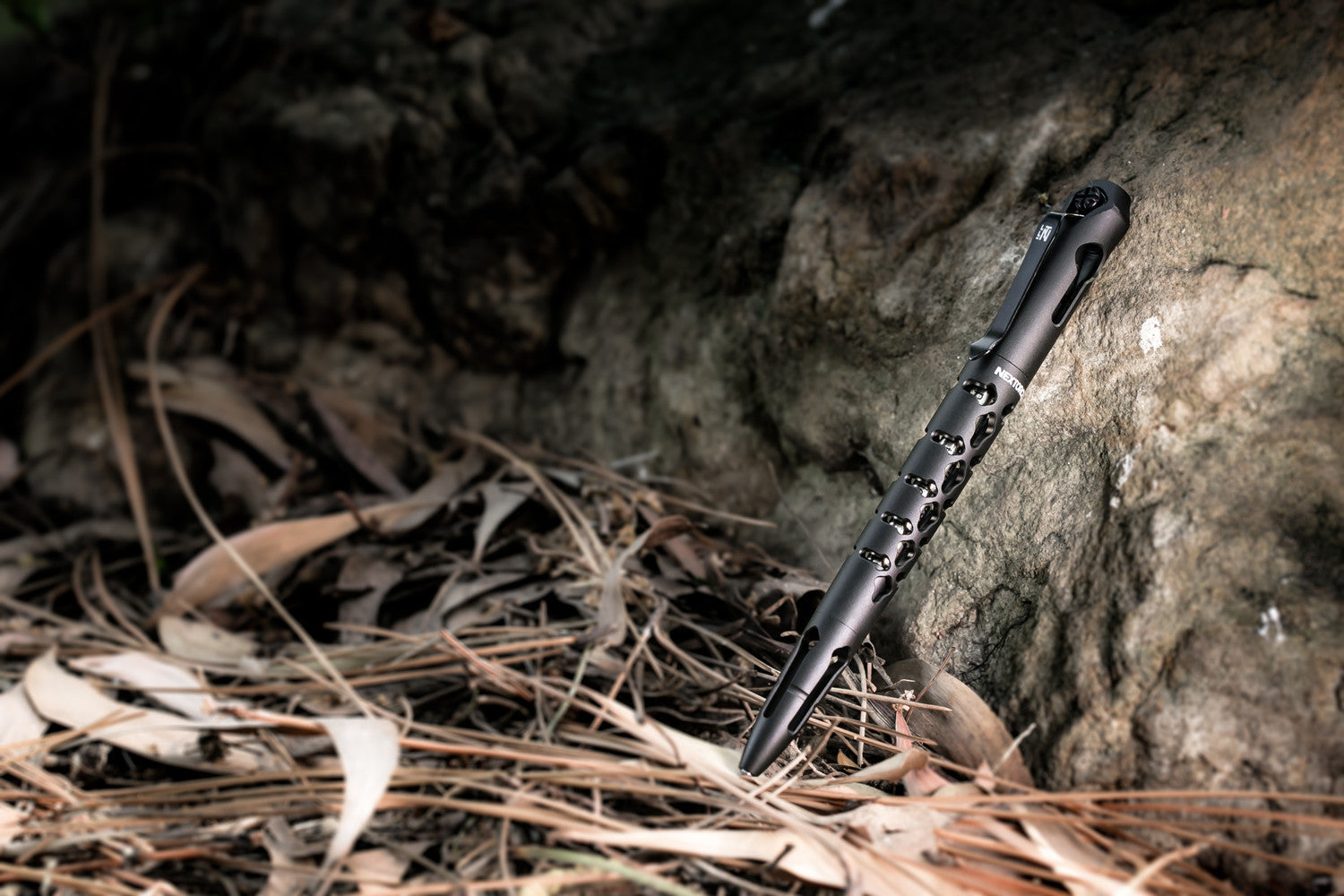 Black Nextorch NP20 tactical pen with skeletonized aluminum body and tungsten glass breaking tip — view 5