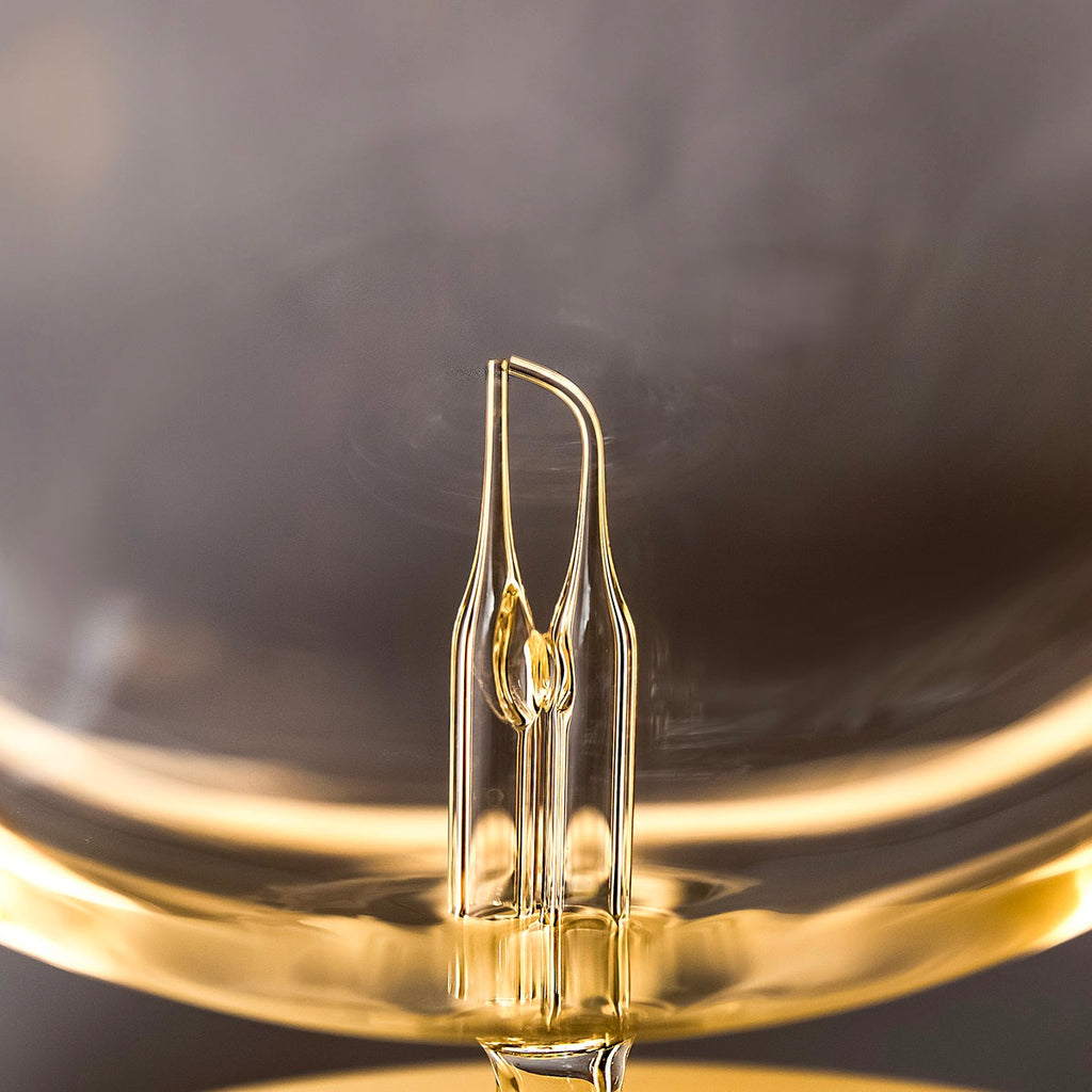 NOVA Ezy waterless essential oil diffuser with hand blown glass reservoir and natural blonde wood base — view 3