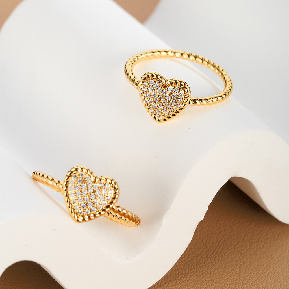 French retro love ring featuring a textured copper band and a sparkling heart shaped zircon diamond — view 2