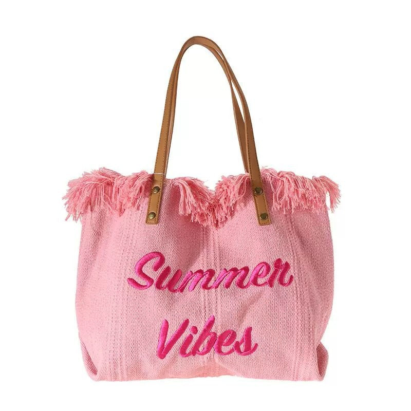 Large woven canvas tote bag for women featuring embroidered letters and sturdy shoulder carry straps — view 5