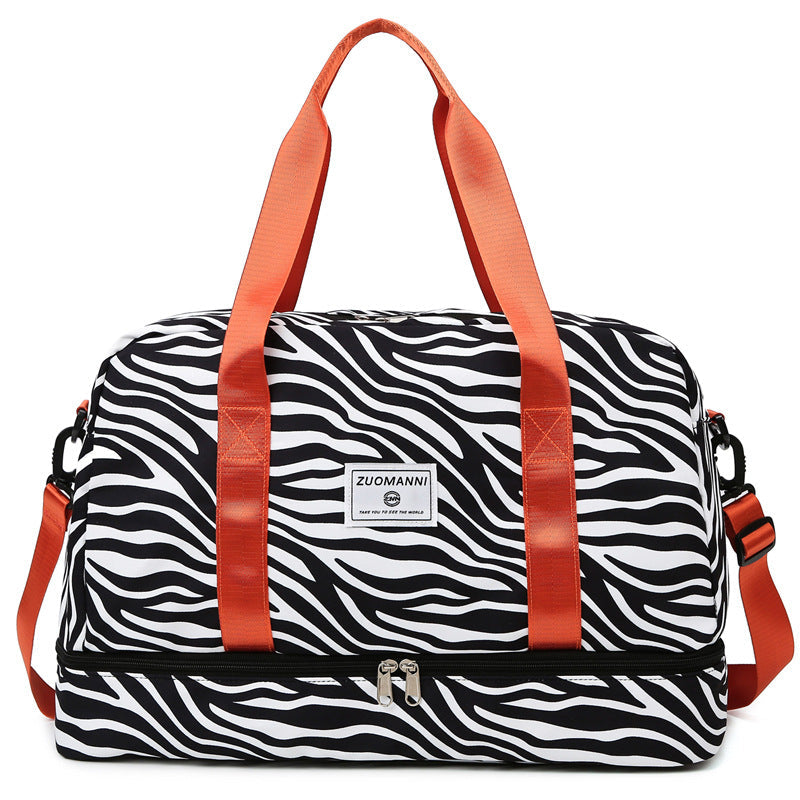 Versatile women's weekender gym and yoga travel bag with spacious compartments and sturdy carrying handles. — view 5