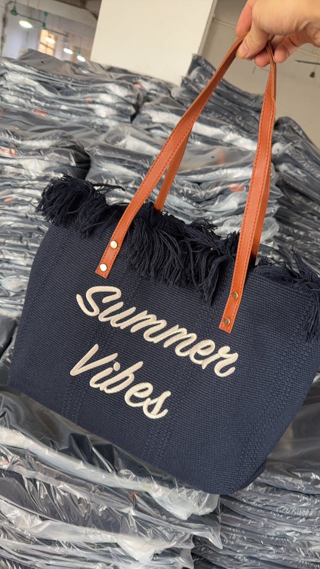 Large woven canvas tote bag for women featuring embroidered letters and sturdy shoulder carry straps — view 4