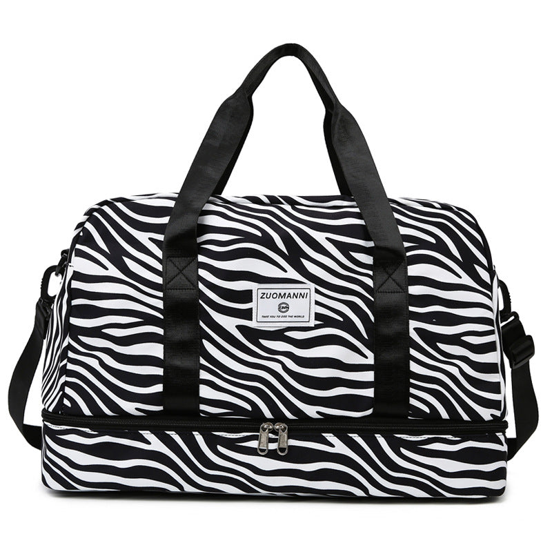 Versatile women's weekender gym and yoga travel bag with spacious compartments and sturdy carrying handles. — view 4