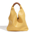 Minimalist commuter shoulder tote bag with sturdy handles for everyday travel and office use