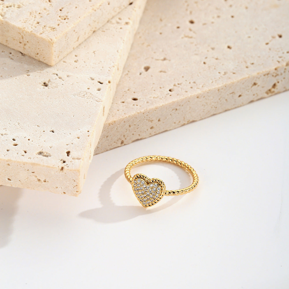 French retro love ring featuring a textured copper band and a sparkling heart shaped zircon diamond — view 3