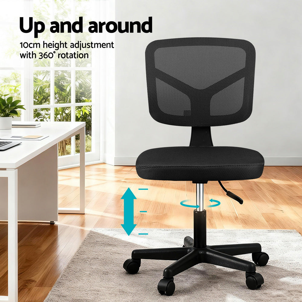 Black armless office chair with breathable mesh back and rolling castors for small workspaces — view 4