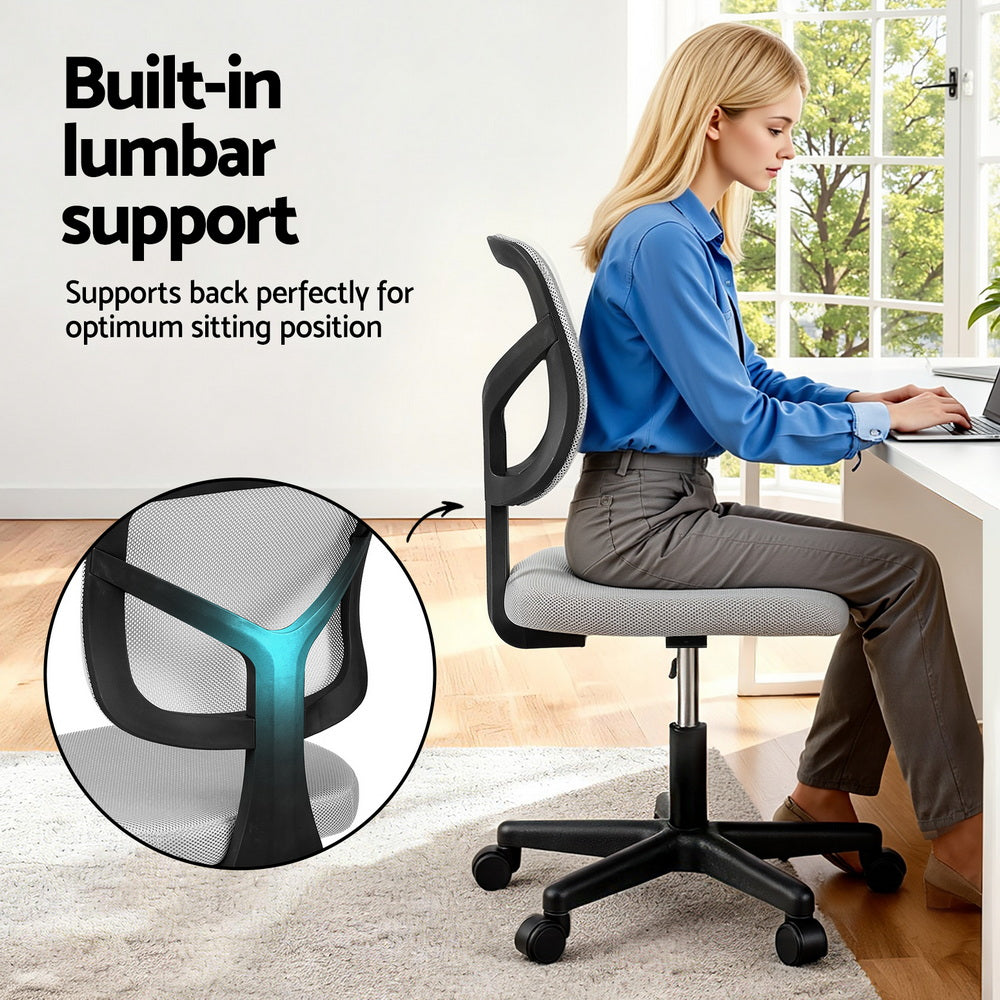 Grey ergonomic armless office chair with breathable mesh back, rolling castors, and sturdy metal base. — view 5