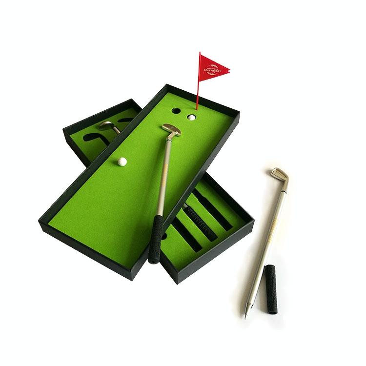 Miniature desktop golf putting mat set with metal golf club pens and small golf balls — view 2