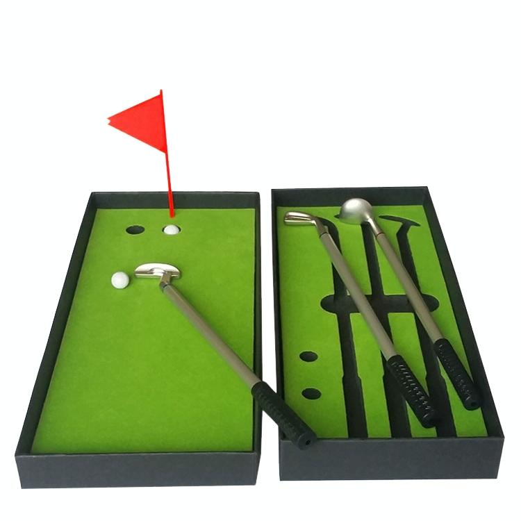 Miniature desktop golf putting mat set with metal golf club pens and small golf balls — view 4