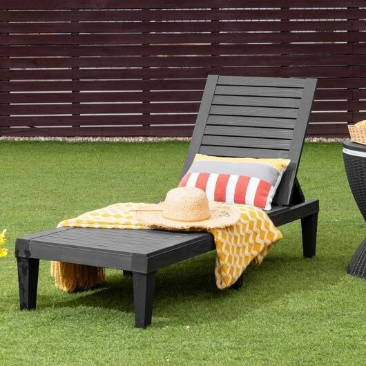 Black outdoor recliner chair with five position adjustable backrest and reinforced legs for patio lounging