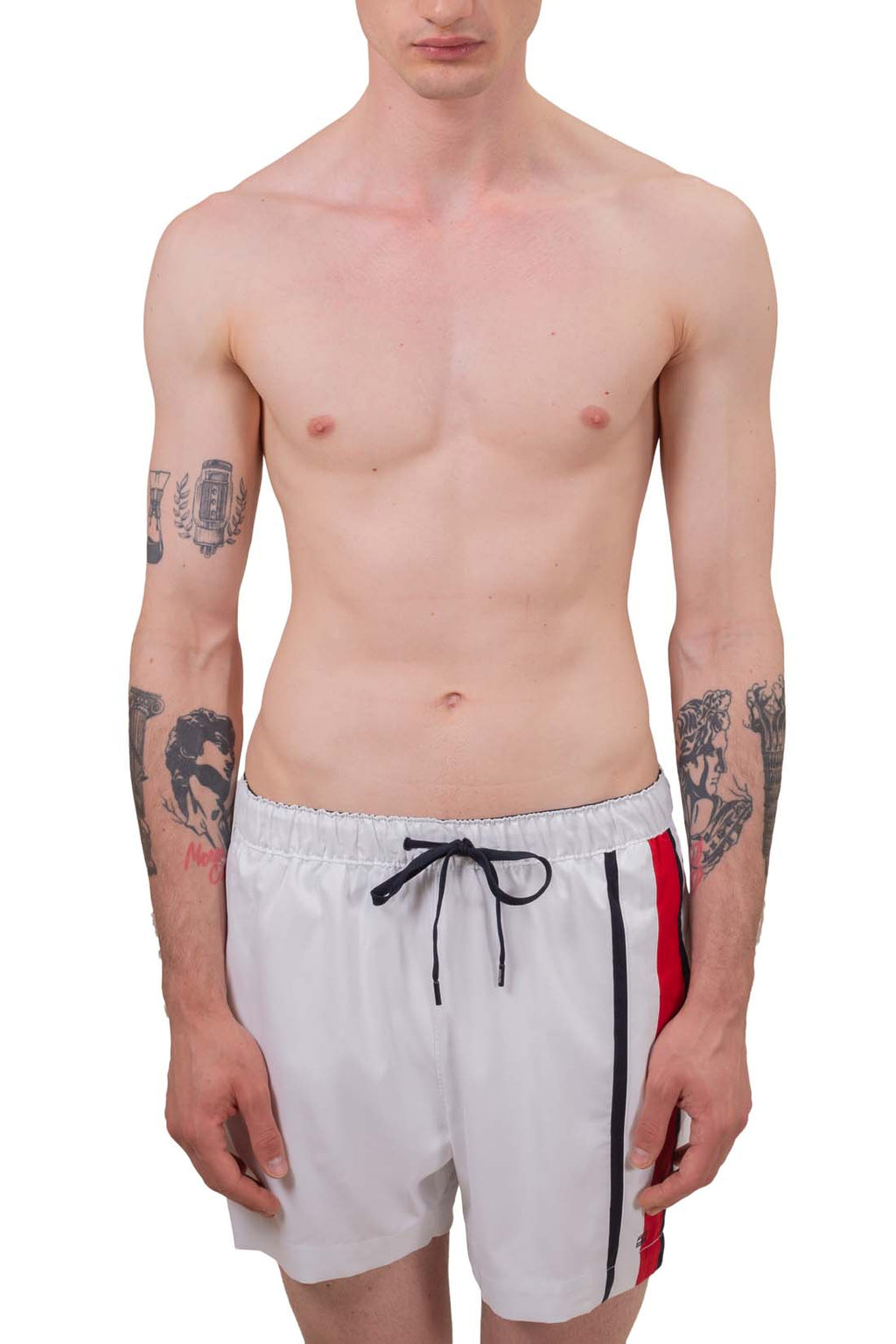 White men's swim shorts with elastic waistband, drawstring, and signature embroidered flag detail on front — view 5