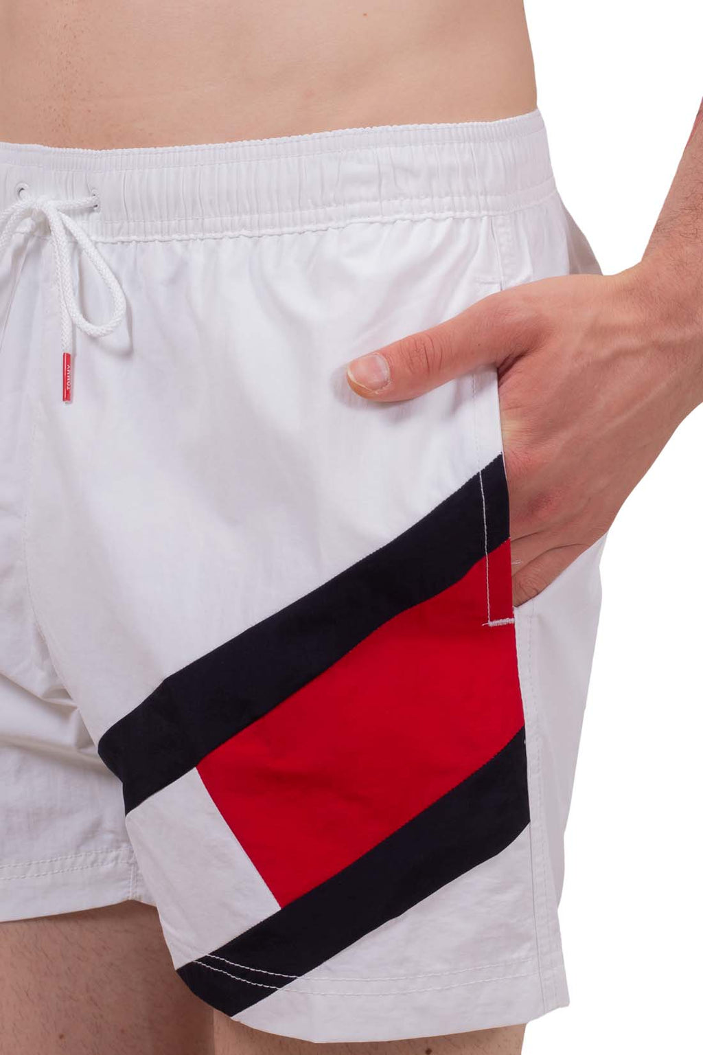 Men's slim fit white nylon swim shorts with drawstring waist and embroidered flag detail — view 3