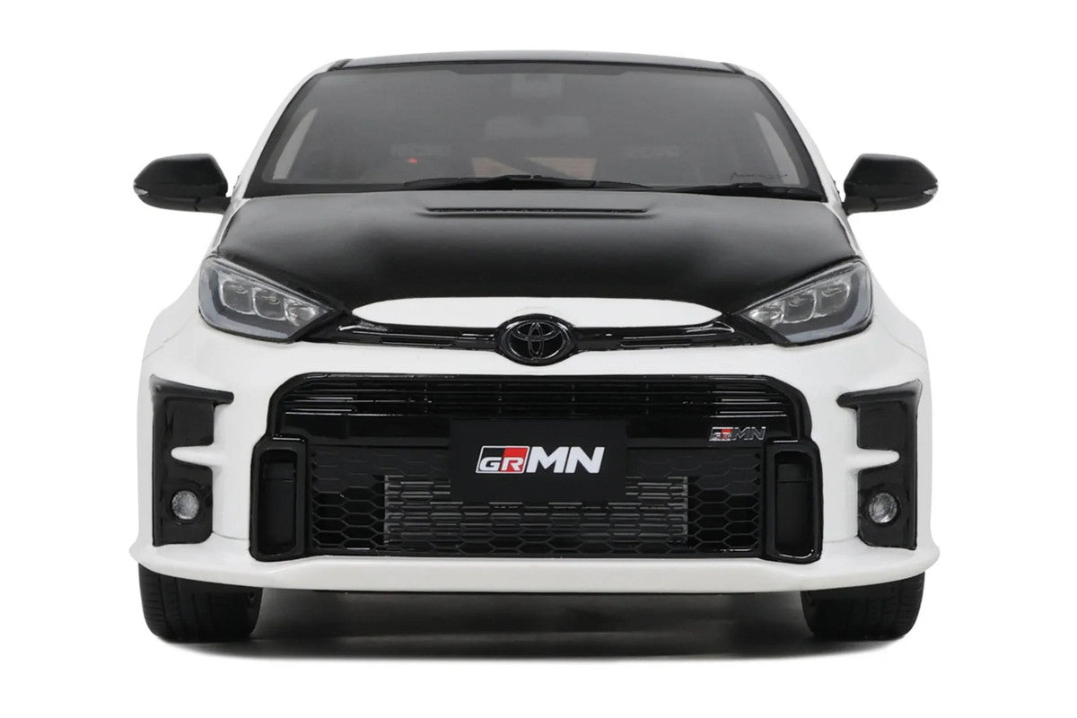 1/18 scale 2022 Toyota GRMN Yaris model car in platinum white pearl with black hood — view 3
