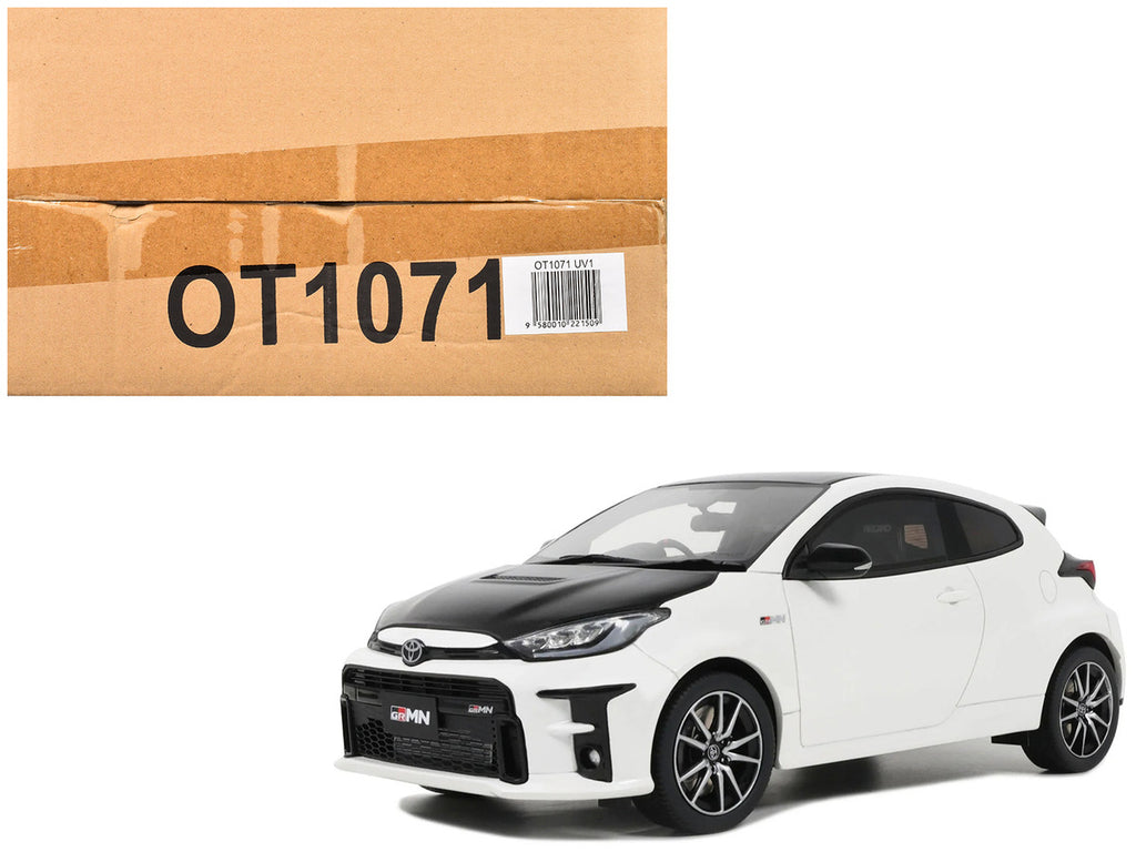 1/18 scale 2022 Toyota GRMN Yaris model car in platinum white pearl with black hood — view 5