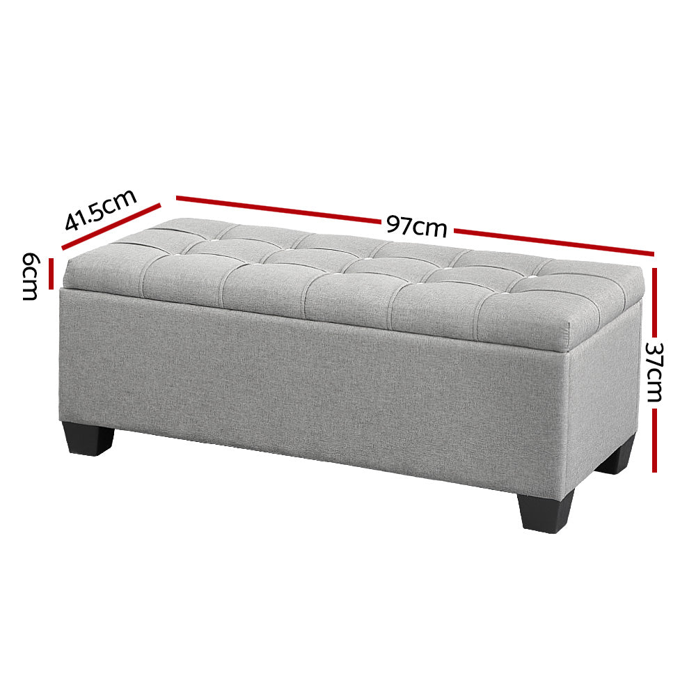 Light grey faux linen tufted storage ottoman with a lift-up lid and detachable wooden legs. — view 2