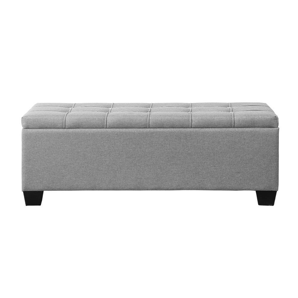 Light grey faux linen tufted storage ottoman with a lift-up lid and detachable wooden legs. — view 3
