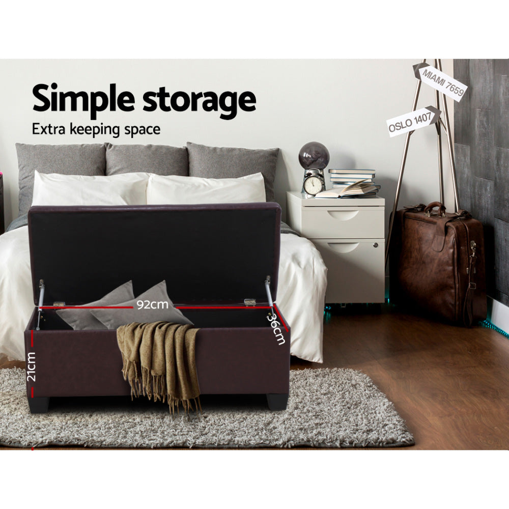 Brown faux leather storage ottoman blanket box with wooden legs and lift-up cushioned lid. — view 5