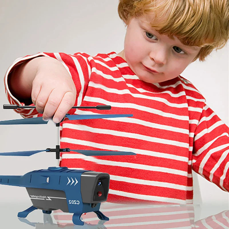 Obstacle avoidance RC helicopter in durable plastic with remote control and USB charging accessories — view 4