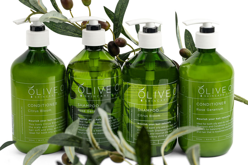 Rose geranium hair conditioner in a 500ml pump bottle with natural olive oil botanical branding. — view 5
