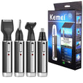 Black 4-in-1 micro hair trimmer electric shaver and grooming accessories on a clean background