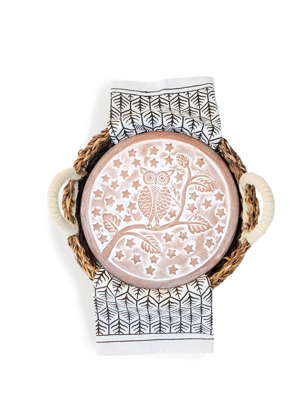 Owl terracotta bread warmer stone in a woven seagrass basket with a printed cotton tea towel — view 5