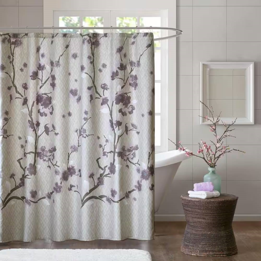 Purple and grey cherry blossom floral pattern cotton shower curtain hanging in a modern bathroom